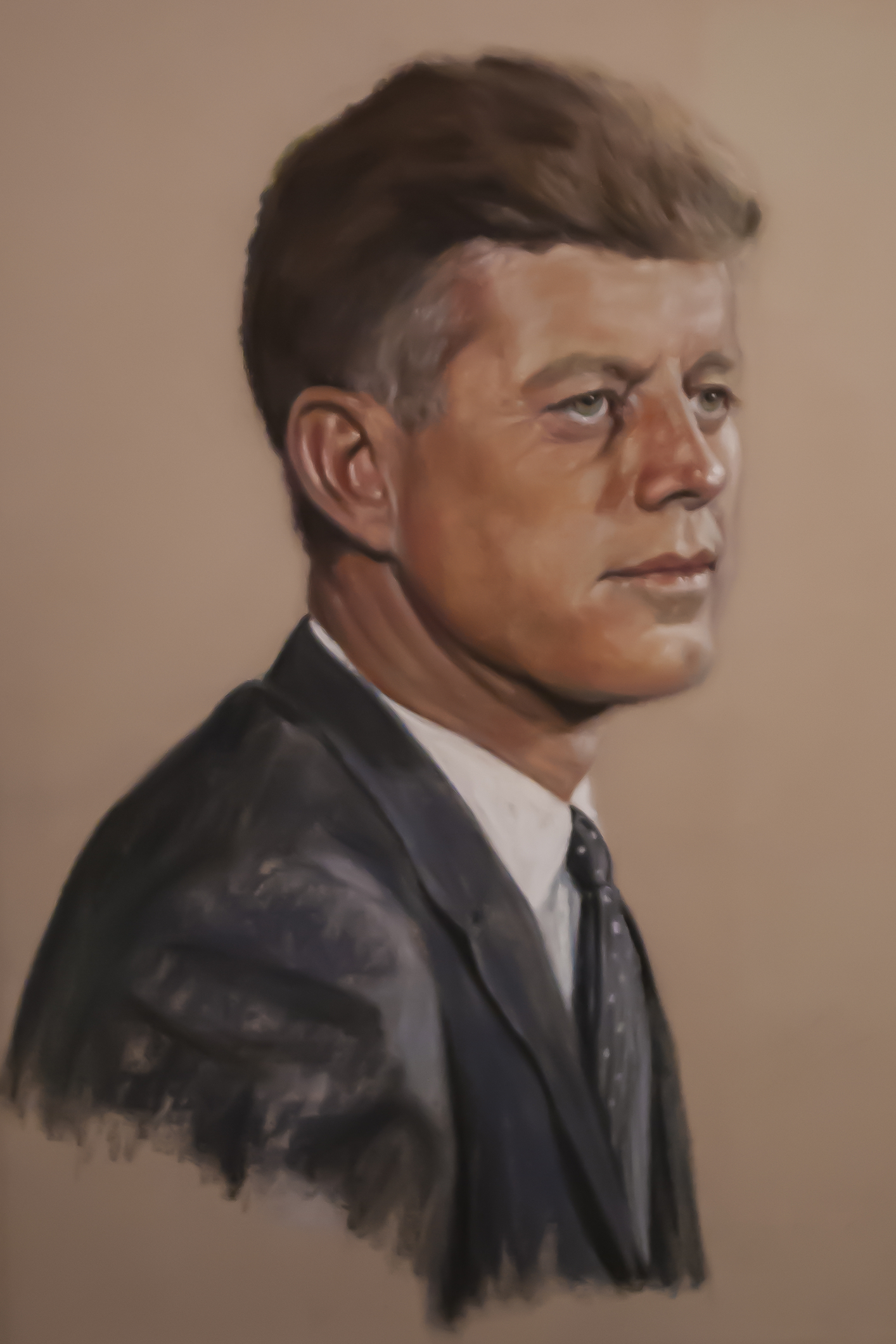 A portrait of John F. Kennedy captured at the National Portrait Gallery commemorating his 100th birthday